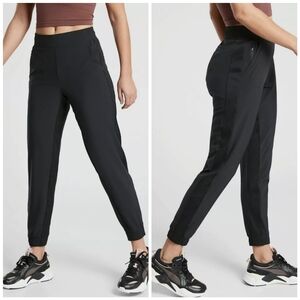 Athleta Black Track Pants with High-Rise Waistband and Tapered Fit